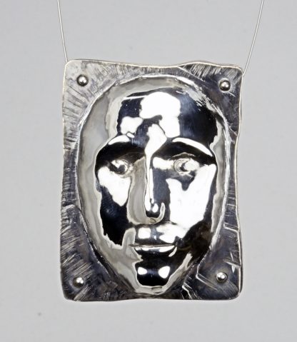 formed silver pendant